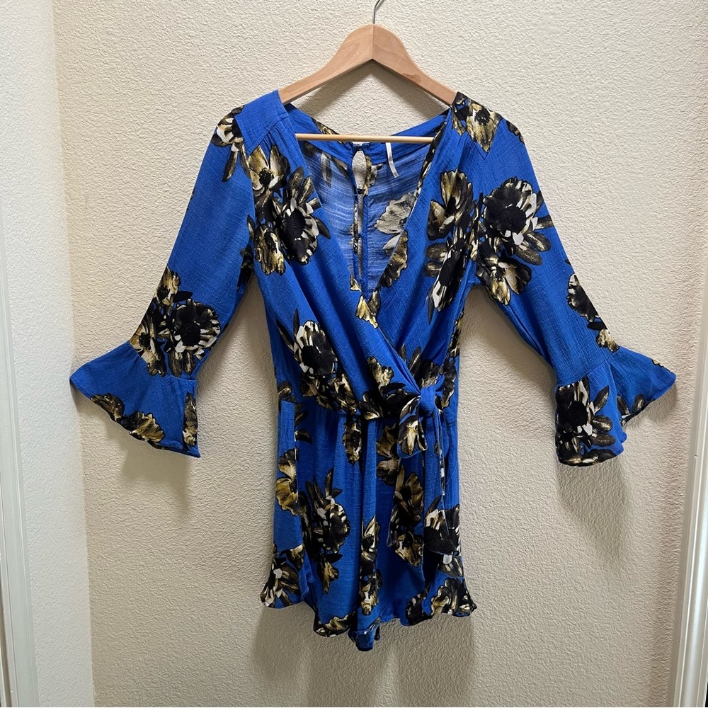 FREE PEOPLE All The Right Ruffles Floral Royal Blue Faux Wrap Romper